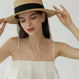 Molten Frame Pearl Pendant Necklace