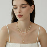 Molten Frame Pearl Pendant Necklace