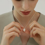 Molten Frame Pearl Pendant Necklace