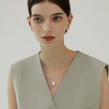 Molten Frame Pearl Pendant Necklace