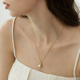 Molten Frame Pearl Pendant Necklace