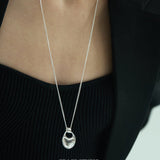 Sculpted Oval Loop Pendant Necklace