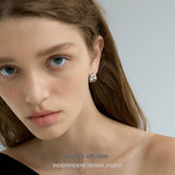 Sculpted Multi-Ridge Cage Hoop Earrings