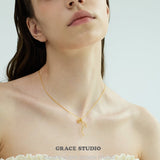 Ribbon Twist Pendant Necklace
