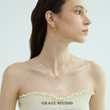 Ribbon Twist Pendant Necklace