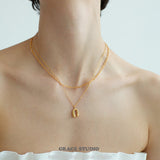 Sculpted U Pendant Necklace & Earrings Set