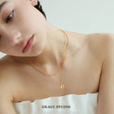 Sculpted U Pendant Necklace & Earrings Set
