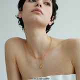 Sculpted U Pendant Necklace & Earrings Set
