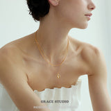 Sculpted U Pendant Necklace & Earrings Set