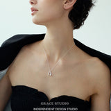 Sculpted U Pendant Necklace & Earrings Set