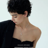Sculpted U Pendant Necklace & Earrings Set