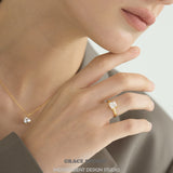 Elegant Emerald-Cut Zirconia Solitaire Ring