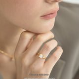 Elegant Emerald-Cut Zirconia Solitaire Ring