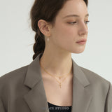 Radiant Zirconia Cross Pendant Necklace