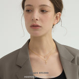 Radiant Zirconia Cross Pendant Necklace