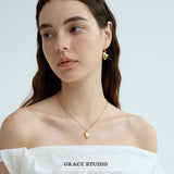 Thorn-Tipped Sculpted Heart Drop Earrings