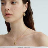 Thorn-Tipped Sculpted Heart Drop Earrings
