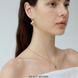 Thorn-Tipped Sculpted Heart Drop Earrings