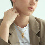 Interlock Oval Bar Pendant Necklace