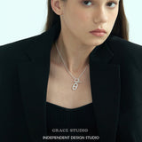 Interlock Oval Bar Pendant Necklace