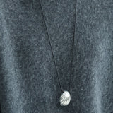 Sculptural Silver Shell Cord Necklace